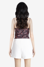 Women's printed cowl top, has geometric print on it, noodle strap, very light weight, trendy and stylish. Can be worn at party.