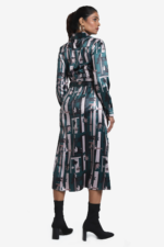 Printed shirt dress, multicolored comes with a belt. Dress has full sleeve, shirt collar, buttons on front, cuff. It is light weight, relaxed fit. Suitable for casual wear.