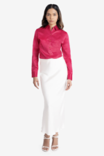 Women's formal shirt, red colored shirt has full sleeves, collar, cuff and golden buttons on front. It has rivets and satin ribbon at back. Regular fit, stylish, comfortable and easy to wear. Formal wear/ work wear.