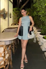 Blue flared mini dress, has mesh panels, sleeveless, halter neck. suitable for party.