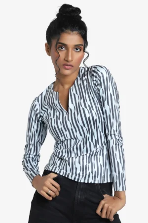 Womens printed fitted top, has full sleeves. Has geometric print on it. casual wear.