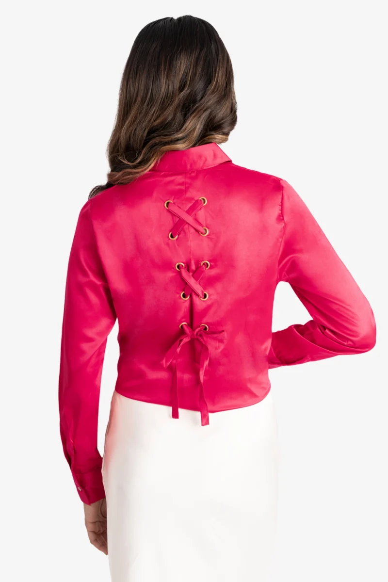 Women's formal shirt, red colored shirt has full sleeves, collar, cuff and golden buttons on front. It has rivets and satin ribbon at back. Regular fit, stylish, comfortable and easy to wear. Formal wear/ work wear.