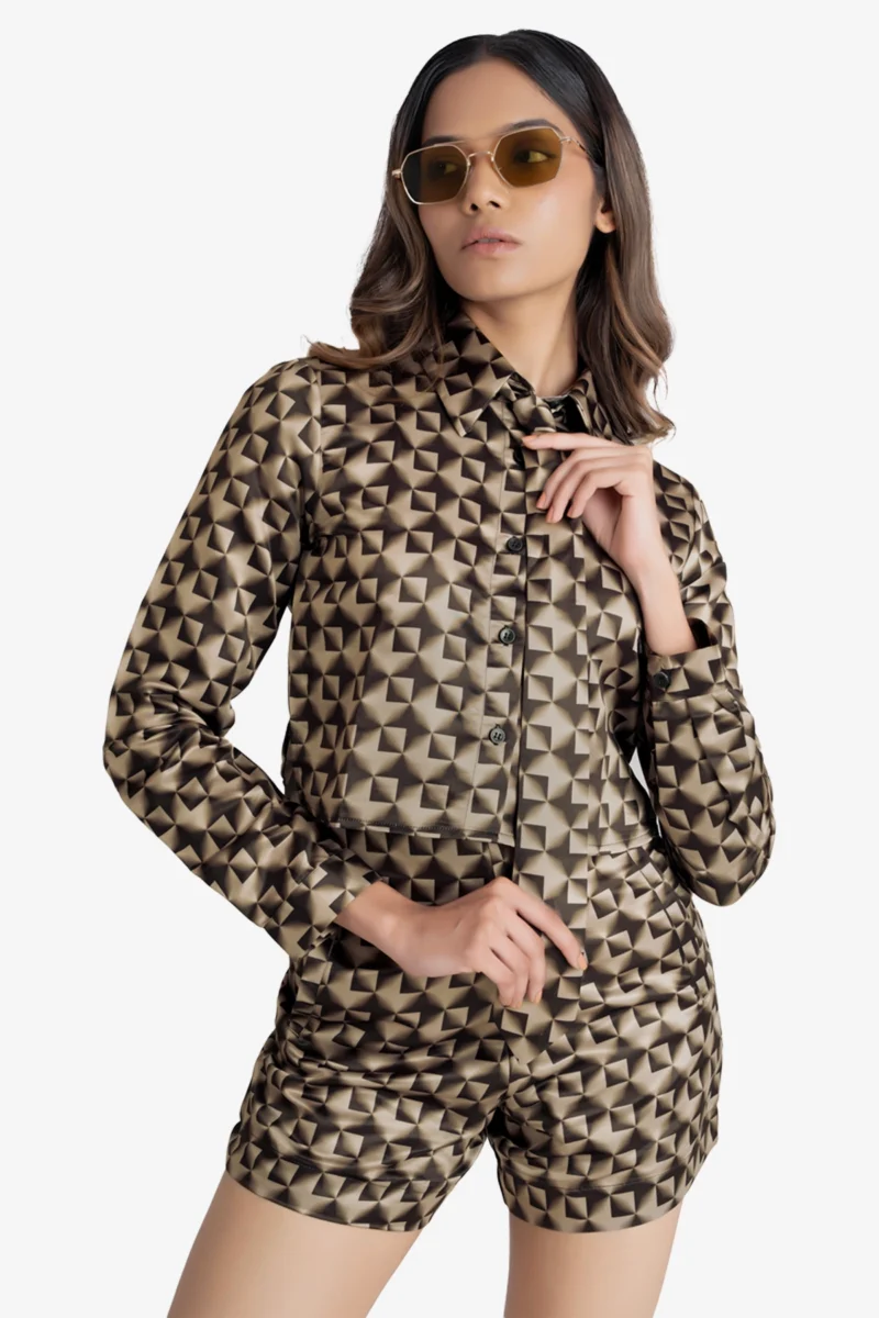 Printed coord set has crop shirt, shorts and a tie in gold and black color. Crop Shirt has full sleeves, collar, cuff and buttons at front it comes with a tie and same color shorts. Very comfortable, trendy can be styled in multiple different ways like formal wear/work wear, casual or party.