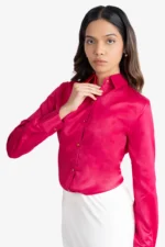 Women's formal shirt, red colored shirt has full sleeves, collar, cuff and golden buttons on front. It has rivets and satin ribbon at back. Regular fit, stylish, comfortable and easy to wear. Formal wear/ work wear.